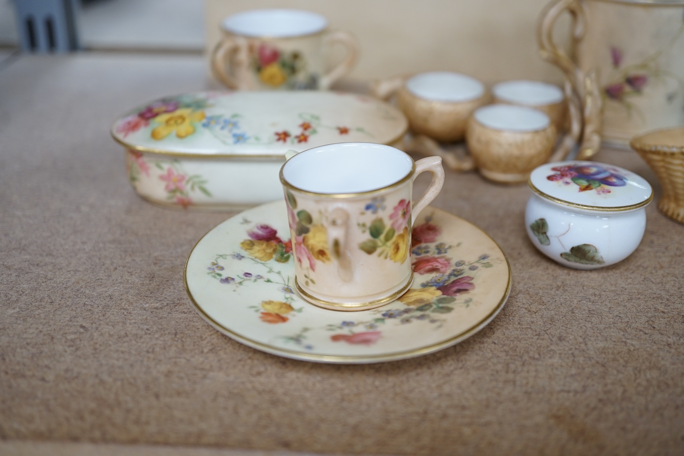 A group of Royal Worcester etc. miniatures including blush ivory tygs and a miniature fruit painted pot and cover, largest 6cm high (8). Condition - mostly fair